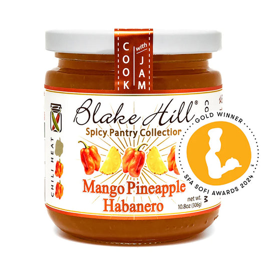 Jar of Blake Hill Mango Pineapple Habanero jam on a white background