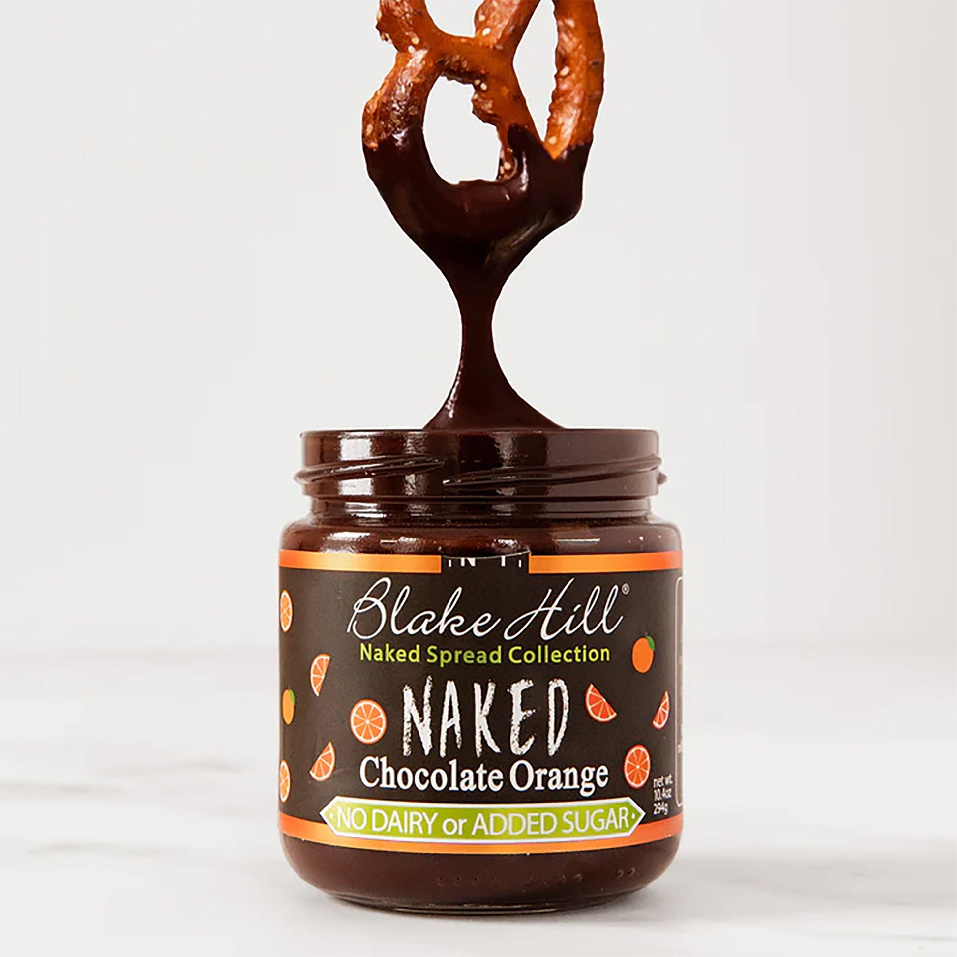 Jar of Blake Hill Naked Spread Collection with chocolate orange flavor on a white background