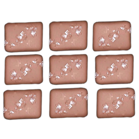 Nine rectangular chocolates with decorative elements on a white background