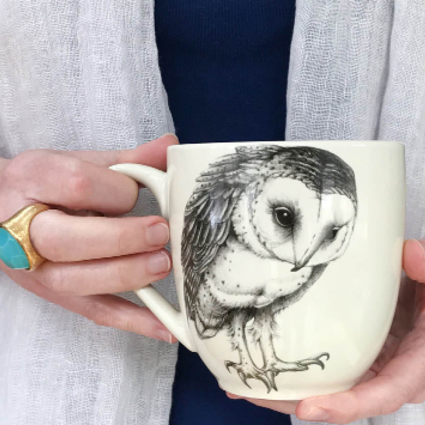 JK Adams Women's hands holding a Laura Zindel mugs