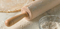 JK Adams rolling pin on marble countertop with flour
