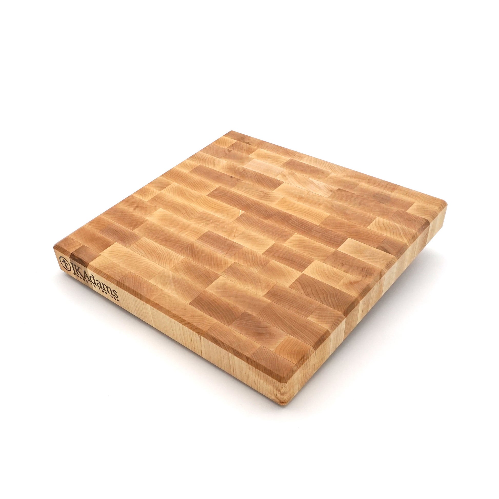A square wooden cutting board made from natural wood blocks, shown at an angle on a white background. The brand name 'WOODZONE' is visible on the left edge.