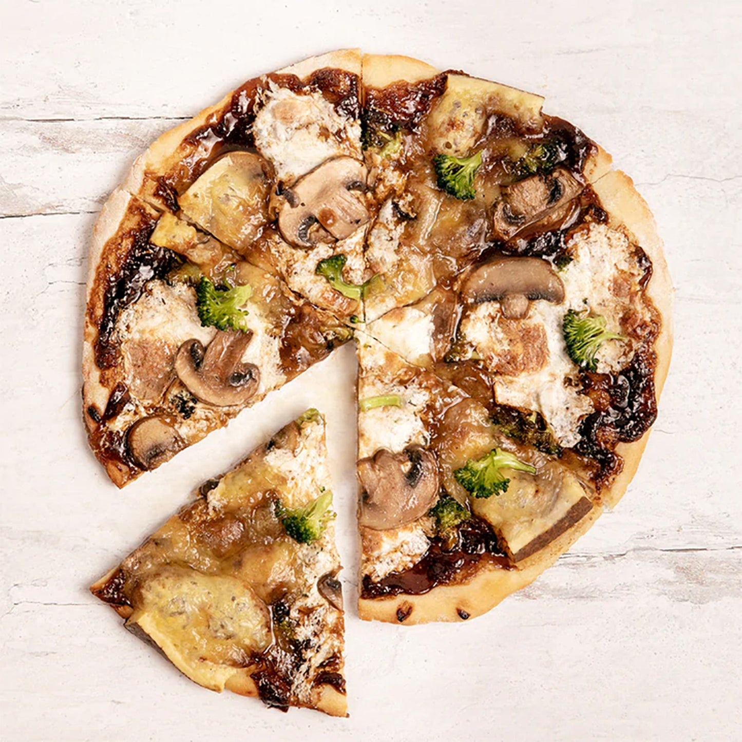 Blake Hill Roasted Garlic Savory Jam pizza with mushrooms, broccoli and cheese.